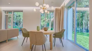 Bright kitchen with white cabinets and a center island