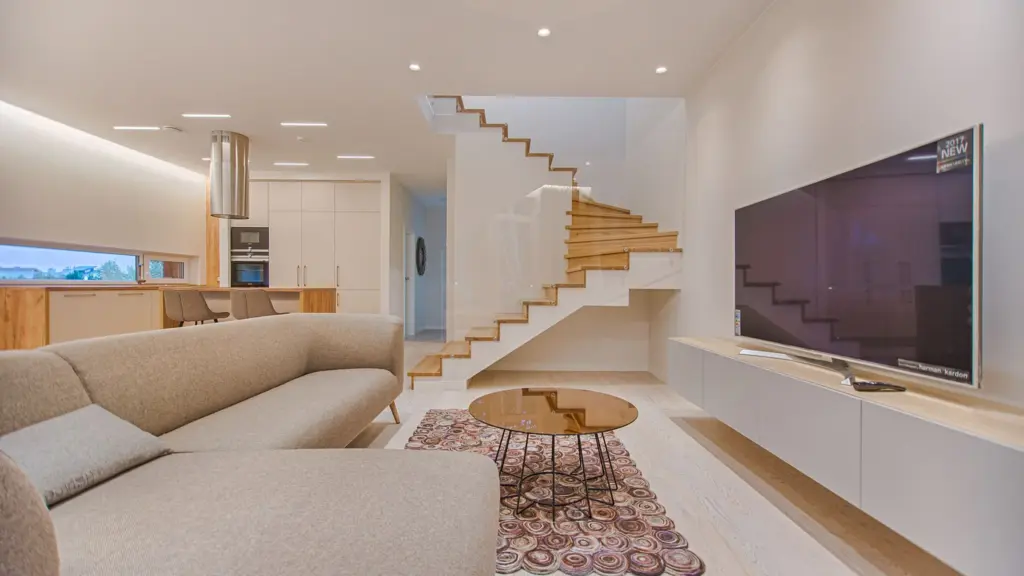 Open-plan interior looking out through floor-to-ceiling glass