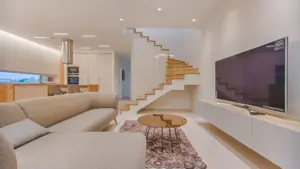 Open-plan interior looking out through floor-to-ceiling glass