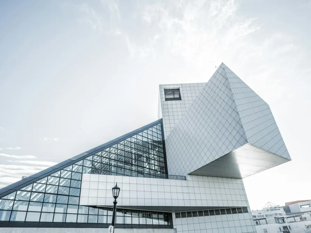 White concrete modern building facade under a clear blue sky