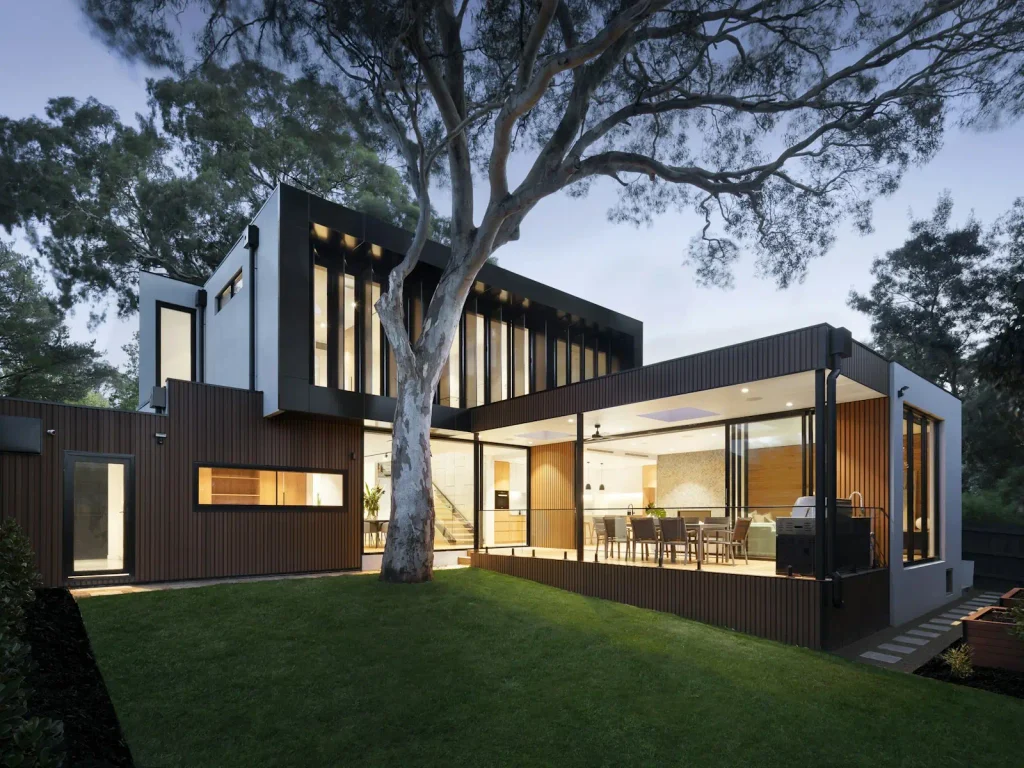Contemporary house exterior with pool and landscaped courtyard